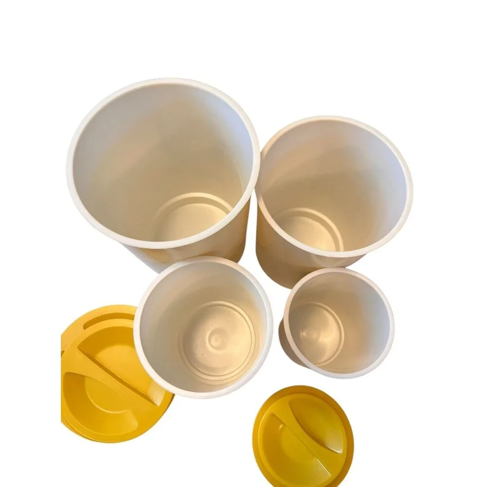Vintage Set of 4 Harvest Gold Nesting Kitchen Canisters Plastic with Yellow Lids